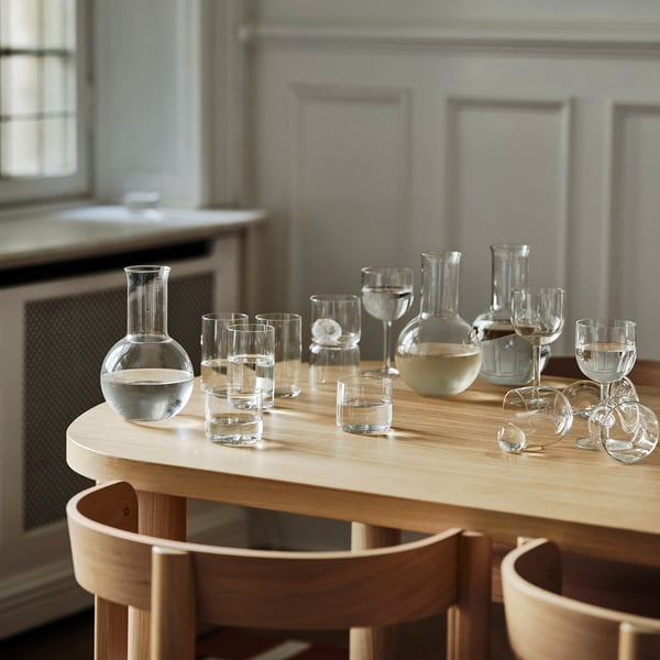 STOCKHOLM 2025 carafe on wooden table with glass containers
