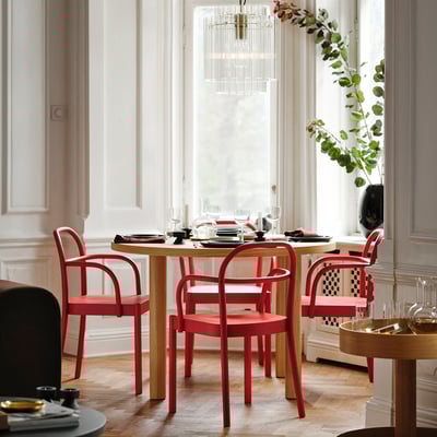 Modern red dining chair, STOCKHOLM 2025. Bentwood design, sturdy beechwood frame, sleek scandinavian style.