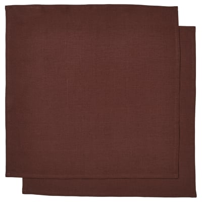 Two dark brown, rectangular linen napkins from the STOCKHOLM 2025 collection, showcasing a natural, textured design.