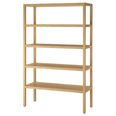 The ikea STOCKHOLM 2025 light brown wooden shelving unit with four wide shelves. It has a sleek, minimalist scandinavian design.