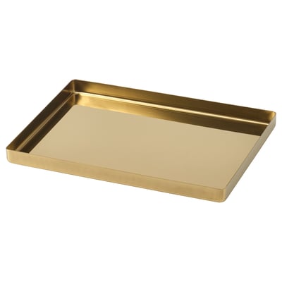 Golden rectangular tray, sleek and modern, part of STOCKHOLM 2025 collection, displayed on white background.