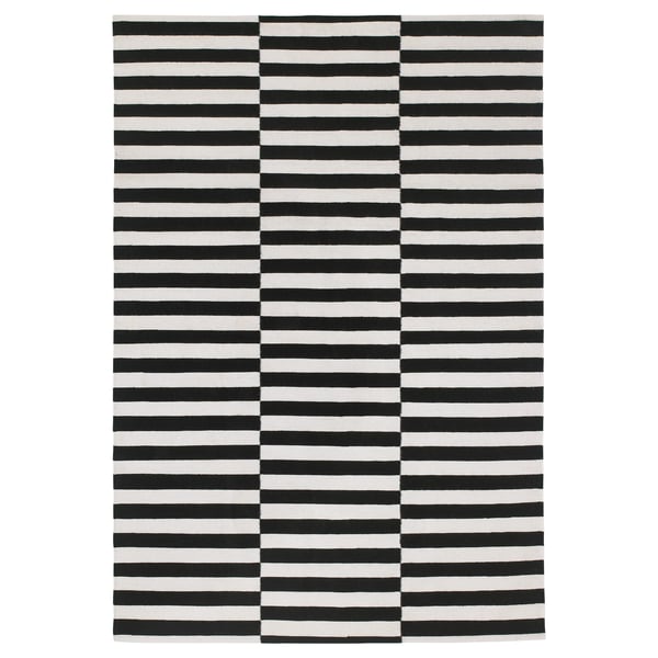 Black and white striped STOCKHOLM rug, handwoven wool, rectangular, flat weave.