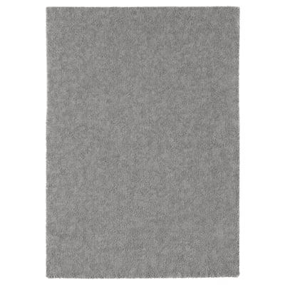 Grey STOENSE rug, soft & sound-dampening, plain design, suitable for bedrooms/living rooms.