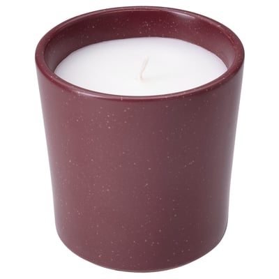 STÖRTSKÖN candle: red ceramic jar, speckled, white wax, cotton wick.