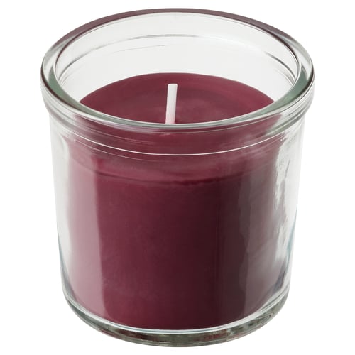 Störtskö̊n candle in purple glass jar with white wick.
