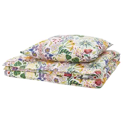 STRANDLUMMER duvet set, white with colourful floral design, rectangular shape, made of soft cotton.