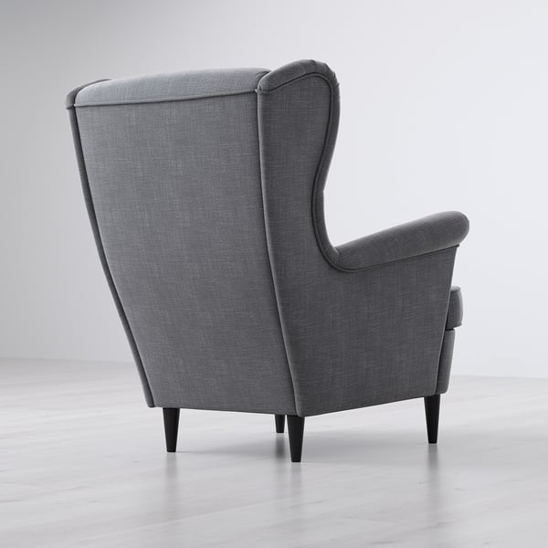 Grey fabric armchair with high, supportive back and wooden legs.