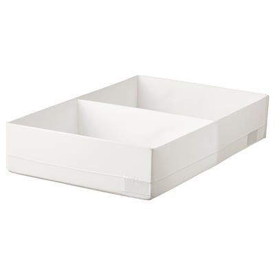 A white STUK storage box with a divided compartment, designed for organising and storing clothes, made from polyester, including recycled material.