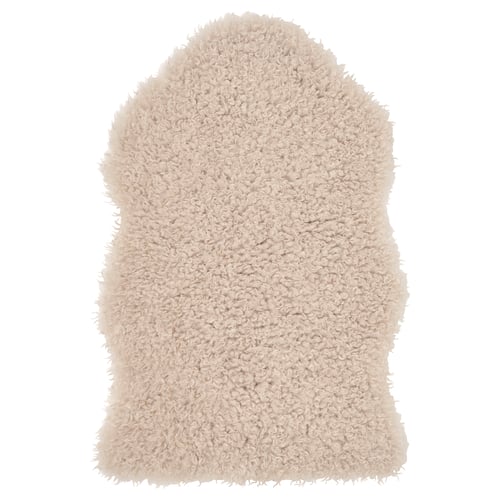 Soft beige, recycled polyester rug, rectangular shape, plush design.