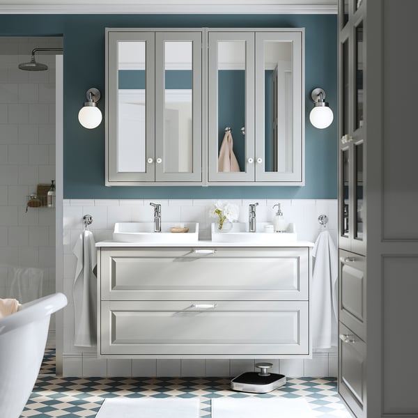 Grey TÄNNFORSEN bathroom cabinet with mirror doors, sink, silver fixtures, lights, tub, large mirror, chequered floor