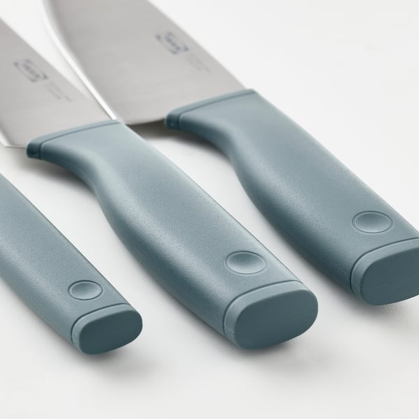 Three knives with durable stainless steel blades and comfortable, firm grip handles, arranged neatly.