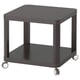 Black square rolling side table on four wheels, modern design, easy to move.