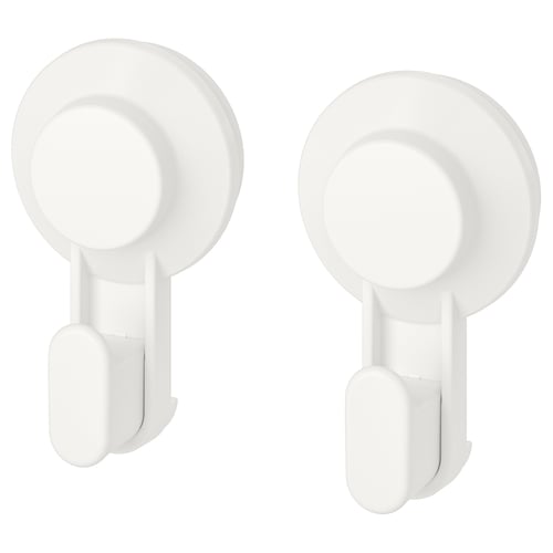 Two white TISKEN suction hooks, circular shape, wall-mounted, no-drill design.