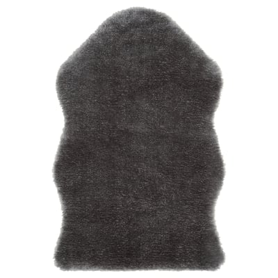 Dark grey TOFTLUND faux sheepskin rug, rectangle shape, soft and fluffy texture.