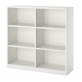 A white TONSTAD bookcase with four adjustable shelves. It has a modern, minimalist design, made from particleboard and painted white.