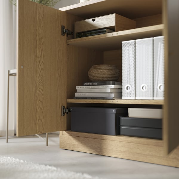 Wooden cabinet with shelves, soft-closing doors, adjustable shelves.