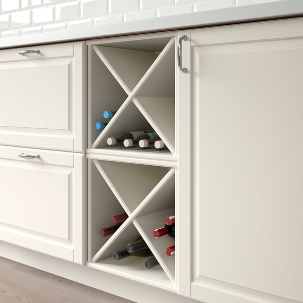 White kitchen cabinet with wine storage, holding 8 bottles, x-shaped dividers for easy access.