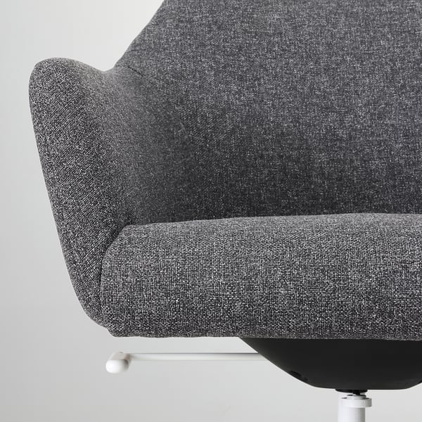 Close-up of a modern grey office chair, showcasing its smooth upholstery and contoured padding.
