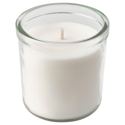 Cylindrical white candle in clear glass holder.