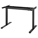 A black TRAVSPORT adjustable desk frame. It has a metal structure with a rectangular top and base, designed for height adjustment.