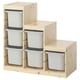 IKEAs TROFAST storage, light wooden frame with white storage bins, designed for childrens toys.