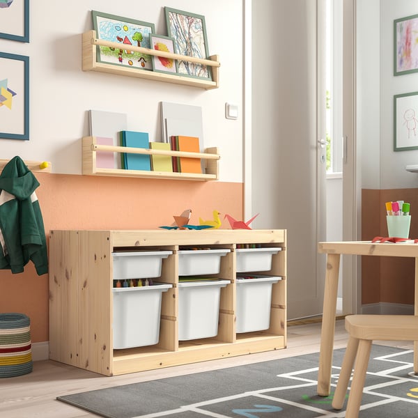 Childs room with TROFAST storage, light wood, white bins. Bright, organised space with low shelf for easy access.