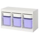 A white TROFAST storage unit with purple and blue plastic bins, ideal for organising childrens toys.