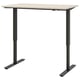 A TROTTEN adjustable desk in beige with black legs, featuring a crank handle for height adjustment.