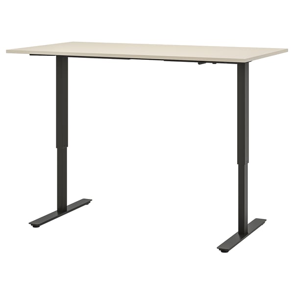 Trotton adjustable standing desk, beige top, black metal legs, rectangular shape.