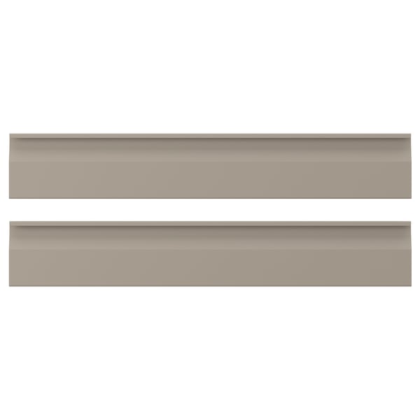 Two beige rectangular boxes with sleek edges and integrated handles, placed horizontally.