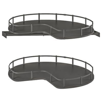 Two dark grey, corner cabinet carousels with circular trays and safety rails.