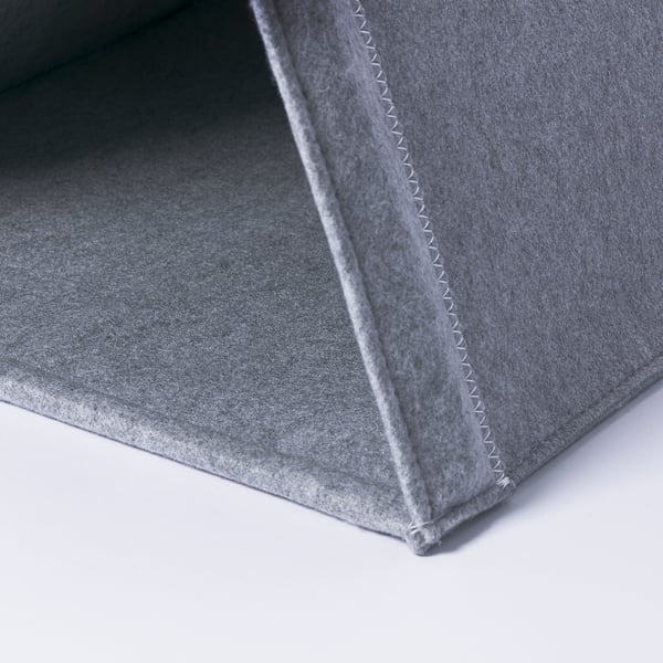 Close-up of UTSÅDD cat beds corner, showcasing sturdy grey fabric with neat stitching.
