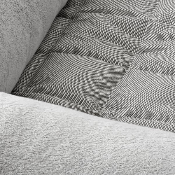 Close-up of dog bed, soft fabric, plush interior, sturdy stitching detail