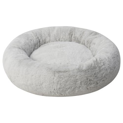 A soft, round pet bed named UTSÅDD in light grey colour. Made from recycled polyester, it raised edges for comfort. Ideal for medium-sized pets.