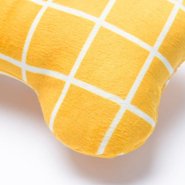 Bright yellow grid-patterned dog toy, soft & vivid, perfect for play.