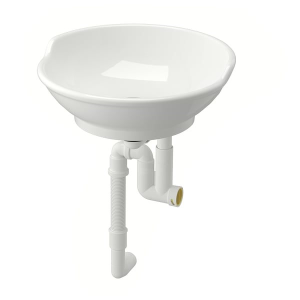 Round, white ceramic wash-basin with traditional design, raised back, and supporting plumbing.