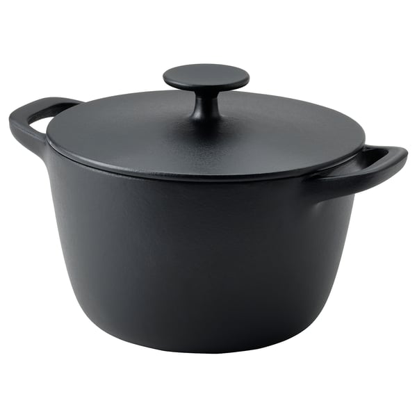 Black enamelled cast iron casserole with two handles and a lid, perfect for even heat distribution.