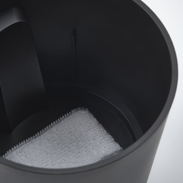 Black self-watering planter with wide opening. Character count: 44