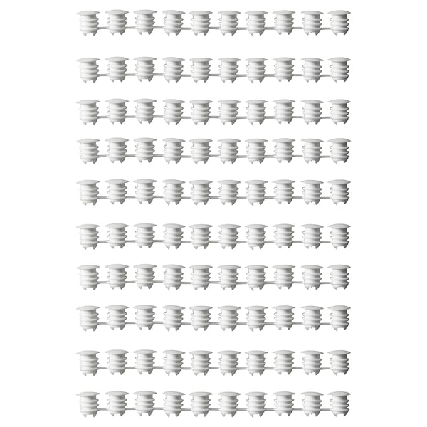 Rows of white VARIERA cabinet hole caps in polyethylene plastic, cylindrical with flanged tops.