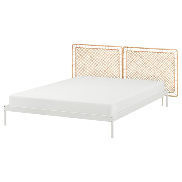 VEVELSTAD bed: white metal frame, rattan headboard, modern design.