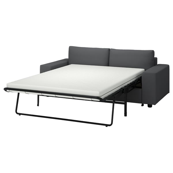 VIMLE grey sofa-bed with thick white mattress, modern design.