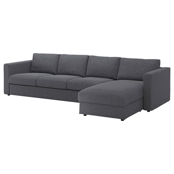The VIMLE sectional sofa is sleek and modern, featuring a dark grey fabric cover on a boxy frame, with one chaise lounge for extra space and comfort.