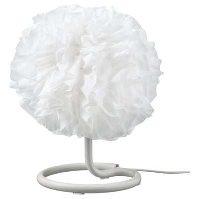 A VINDKAST lamp. Its white, spherical, and made of recycled polyester. The base is curved, sleek, and minimalistic.