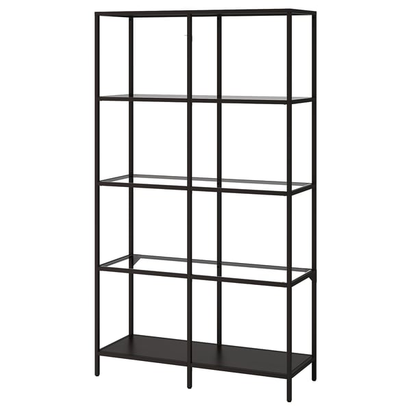 The VITTSJÖ shelf is a modern, black metal and glass storage unit with five transparent shelves.