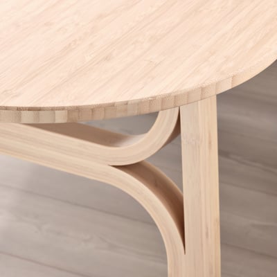 Modern bamboo table with smooth, rounded edges and sleek design, highlighting high-quality craftsmanship and sturdy legs.