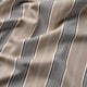 Striped beige fabric, high quality, tightly woven. Natural cotton, soft touch, machine washable. Classic, durable design.