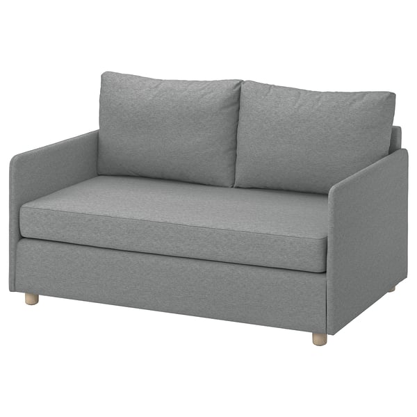 Pilka sofa-lova FRIDHULT, minimalistinio dizaino iš perdirbto audinio ir medžio, idealiai tinkanti mažoms erdvėms.