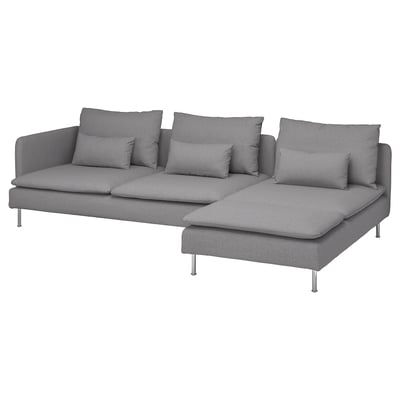 Moderni pilka L formos sekcijinė sofa su aptakiomis metalinėmis kojomis ir pliušinėmis pagalvėlėmis.