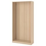 Рамка для шкафа ikea PAX в белой морилке. Он изготовлен из переработанных материалов и спроектирован узким, идеально подходящим для помещений с ограниченным пространством.
