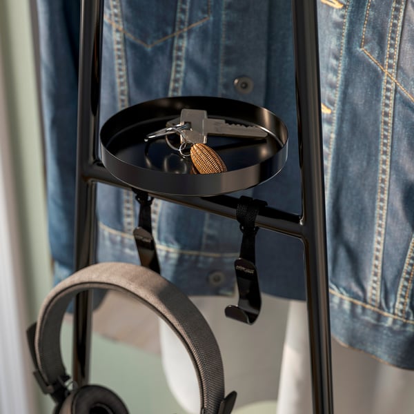 Small space clothes rack with built-in tray for keys and hook for headphones. Slim design, ideal for hallways.